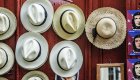hats on a door in cuba